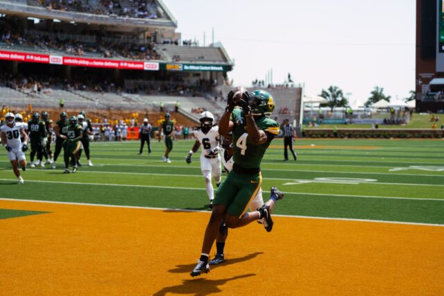 Senior wide receiver Louis Brown IV secured a catch in the end zone for a touchdown in the Bears' 42-7 victory over Samford Saturday at McLane Stadium. Brady Harris | Photographer