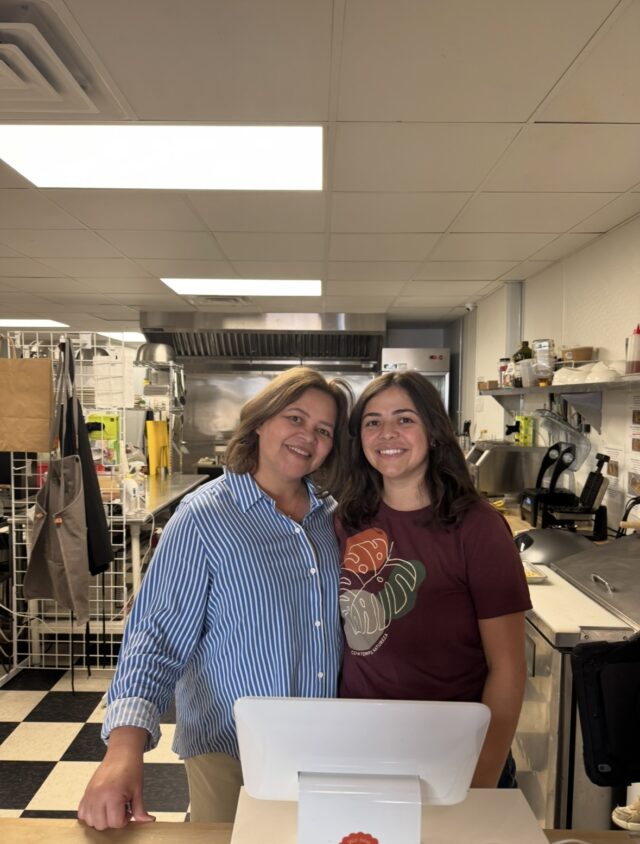Co-owners Laís Loewen, right, and her mother, Cida, stand behind the counter of Luna Café.