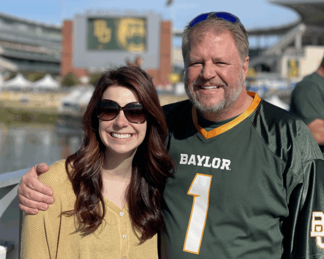 Bailey and Matthew Brammer pose outside McLane Stadium before a game during Baylor Premiere. Photo courtesy of Bailey Dixon