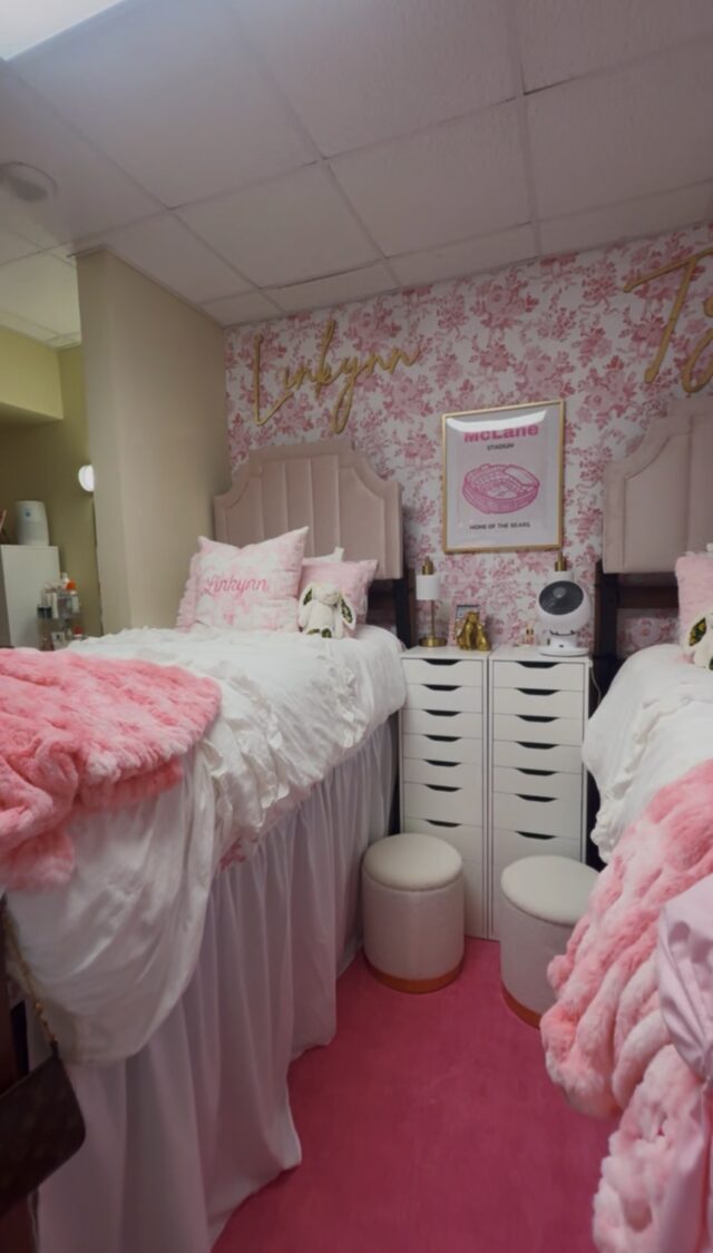 Lunsford's pink-themed dorm room features fluff and frills on her bed, and floral details on her stick-and-peel wallpaper. Photo courtesy of Linkynn Lunsford.