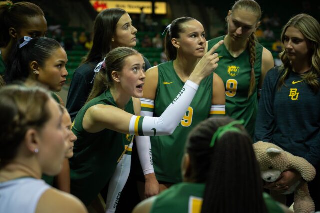 Junior outside hitter Kendal Murphy encourages her teammates in a huddle during the Bears' 3-0 victory over Houston at the Ferrell Center on Wednesday. Sam Gassaway | Photographer