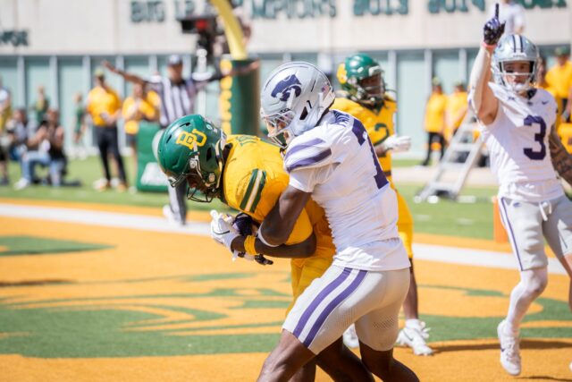 Kansas State's senior safety VJ Payne blocks redshirt senior tight end Michael Trigg from completing a touchdown pass during the Bears' 35-34 victory over Kansas State at McLane Stadium on Saturday. Sam Gassaway | Photographer