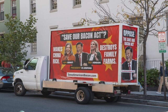 A truck nearby the Capitol advertises a message for passersby to stop the Save Our Bacon Act a bill that like many others, won’t be voted on until the government shutdown is ended. Jake Schroeder | Photographer