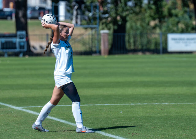 Junior defender Natalie Vatter throws the ball into play. Mary Thurmond | Photo Editor