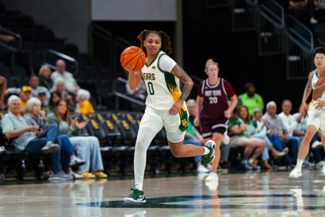 Redshirt sophomore guard Taliah Scott takes the ball up the court after a Baylor rebound. Brady Harris | Photographer