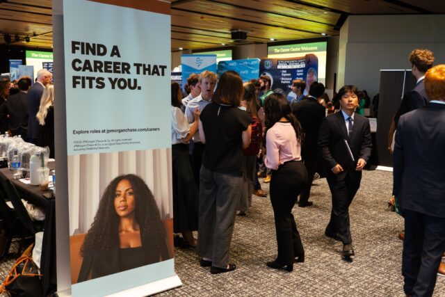 Students speaking to analysts and recruiters from JP Morgan during Baylor's Career Day Wednesday afternoon at the Mark and Paula Hurd Welcome Center. Brady Harris | Photographer
