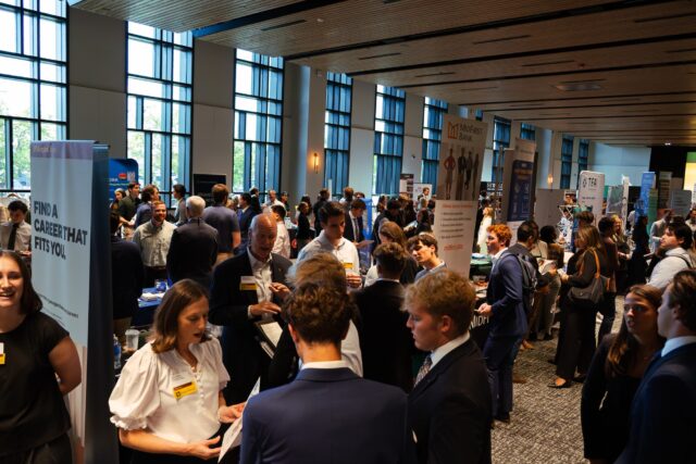 Students networking with analysts and recruiters from JP Morgan and others during Baylor's Career Day Wednesday afternoon at the Mark and Paula Hurd Welcome Center. Brady Harris | Photographer