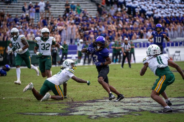 Baylor's defense fails to intercept the ball from TCU's junior wide receiver Major Everhart. Sam Gassaway | Photographer