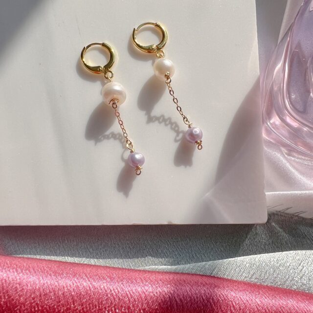 Katzav displays her pearl-drop earrings, inspired by her June birthstone | Photo courtesy of Sivan Katzav