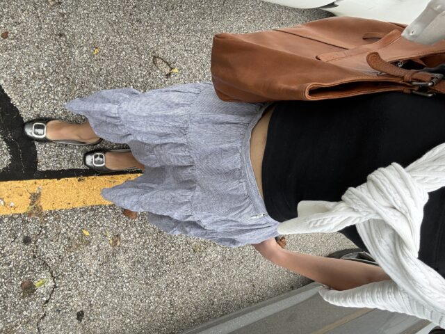 Savage wears one of her favorite trends -- pinstripes -- in a fully thrifted outfit | Photo courtesy of Audrey Savage