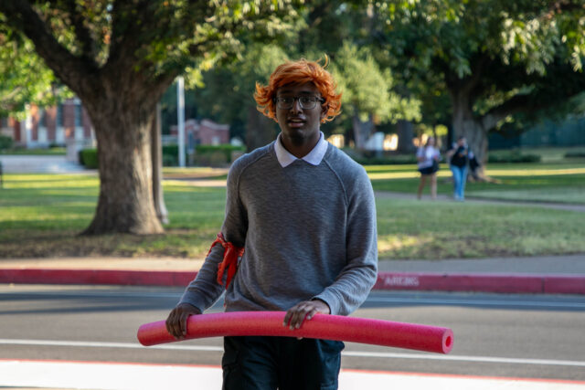 Warren, N.J., sophomore Davod Frederick, the "Ron Weasley" hero, prepares to stun zombies. Hannah Webb | Focus Editor