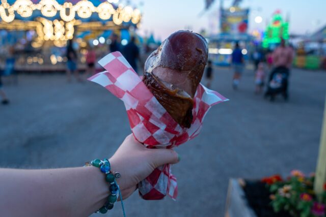 “Texas to the Bone Turkey Legs” served up huge, famous fair turkey legs that were salty, chewy and not very tender for $20. Mary Thurmond | Photo Editor