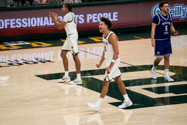 Senior guard Dan Skillings Jr. celebrates after the Bears' score against Tarleton in Friday nights game. Alyssa Meyers | Photographer