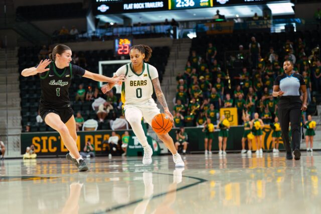 Redshirt sophomore Taliah Scott takes control and charges towards the basket. Brady Harris | Photographer