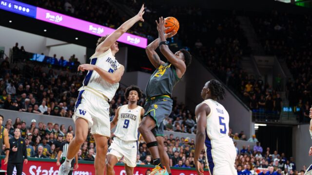Freshman guard Tounde Yessoufou takes a contested shot in the key. Brady Harris | Photographer