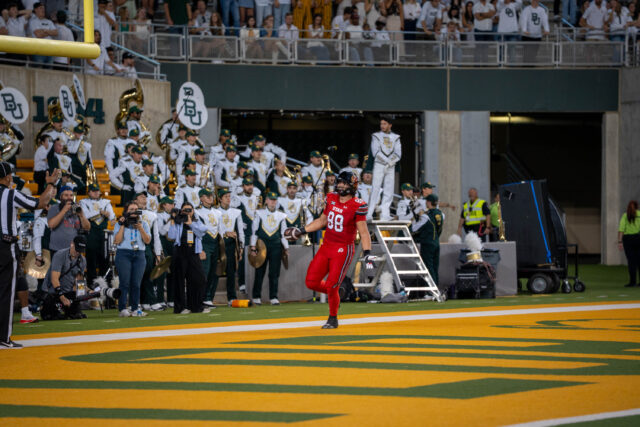 Utah's senior tight end Dallen Bentley scores a touchdown during the Bears' 55-28 loss against Utah at McLane Stadium on Saturday. Sam Gassaway | Photographer