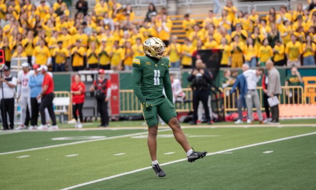 Redshirt junior linebacker Keaton Thomas celebrates after gaining yards during the Bears' 31-24 loss against Houston on Saturday. Sam Gassaway | Photographer