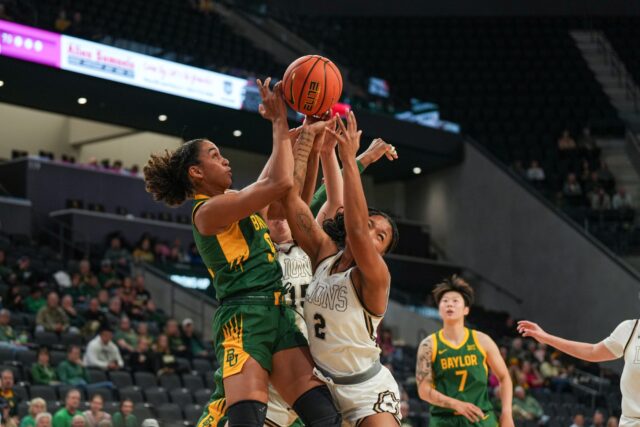 Junior forward Kiera Pemberton battles for the ball during the Bears' 76-63 win against Lindenwood Sunday afternoon at Foster Pavilion. Alyssa Meyers | Photographer