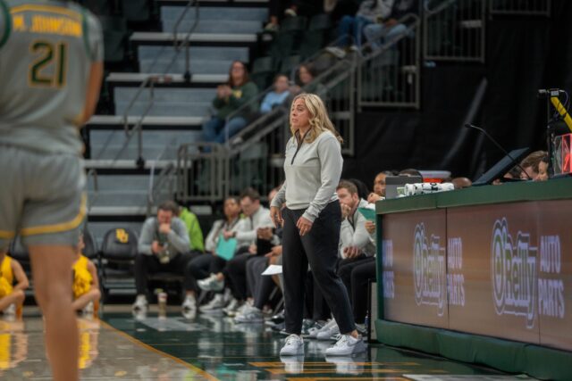 Head coach Nicki Collen engages with her players from the sideline during the Bears' 76-35 victory over Grambling State at Foster Pavilion on Sunday. Sam Gassaway | Photographer