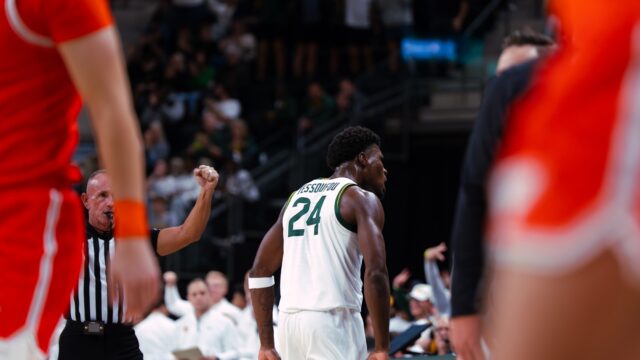 Freshman guard Tounde Yessoufou celebrates towards the bench after nailing a buzzer beater to lead the Bears' into halftime. Brady Harris | Photographer