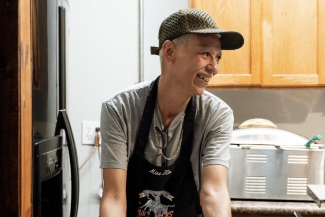Kim Hicks, co-founder of Papa Jack's smiles behind the counter. Known as “Mama Kim” to Baylor students, she serves customers like family. Courtesy of Reece Reiling.