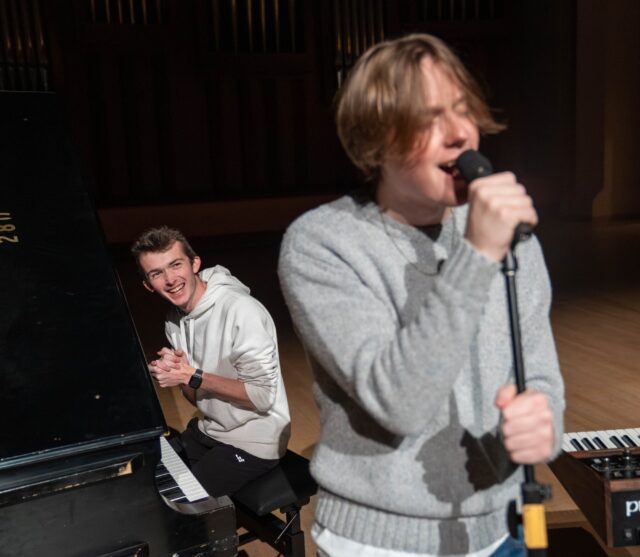 Dylan Plant sings while Carson Iltis looks on from the piano. Mary Thurmond | Photo Editor