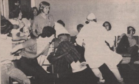 The Pie Man finds a victim in Penland Hall Tuesday, February. 10, 1976 as interested bystanders enjoy the scene. Lariat file photo