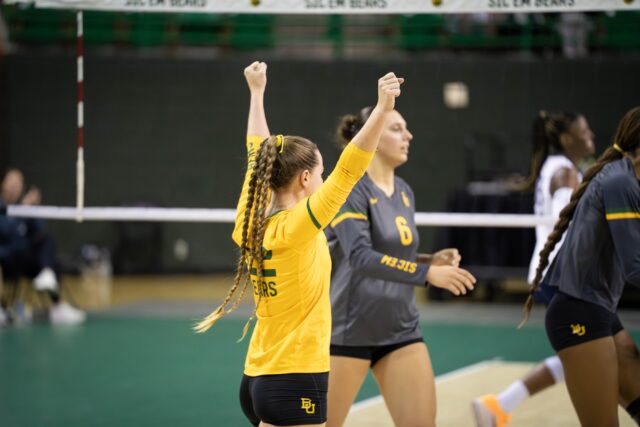 Freshman libero Morgan Madison celebrates during the Bears 3-0 victory over West Virginia at the Ferrell Center on Friday. Sam Gassaway | Photographer