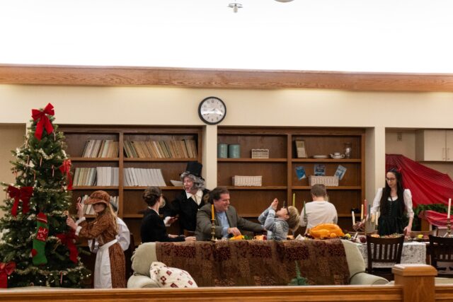 The last stop during the immersive storytelling of the Christmas Carol in Carroll Science was the Cratchit family Christmas dinner. Alyssa Meyers | Photographer