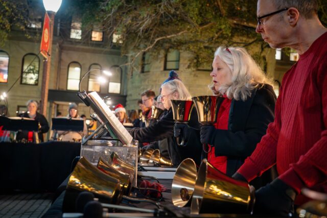 The Columbus Ave Baptist Church Hand-bell Choir played a selection of Christmas carols at the Vera Martin-Daniel Plaza during Christmas on 5th on Thursday. Sam Gassaway | Photographer