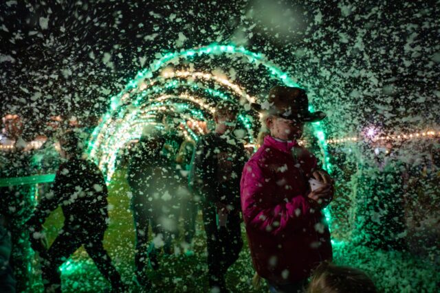 Children and children at heart got a chance to play in the snow at fountain mall during Christmas on 5th on Thursday. Sam Gassaway | Photographer