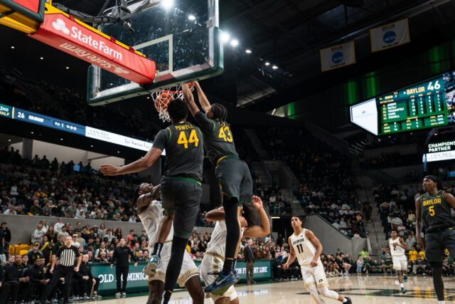 Redshirt sophomore guard Cameron Carr flies in to dunk the ball during the Bears' 86-67 win Wednesday night against Colorado at Foster Pavilion. Alyssa Meyers | Photographer
