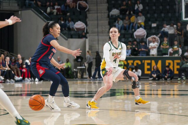 Graduate guard Jana Van Gytenbeek dishes a pass to her teammate during the Bears' 74-60 win on Saturday night against Arizona at Foster Pavilion. Jake Schroeder | Photographer