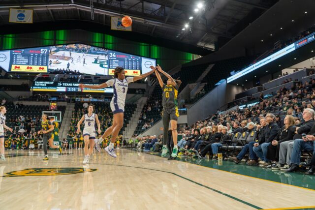 Redshirt Sophomore guard Taliah Scott shoots a three pointer at the Baylor vs Kansas State Women's basketball game on Monday night at Foster Pavilion. Caleb Garcia | Photographer
