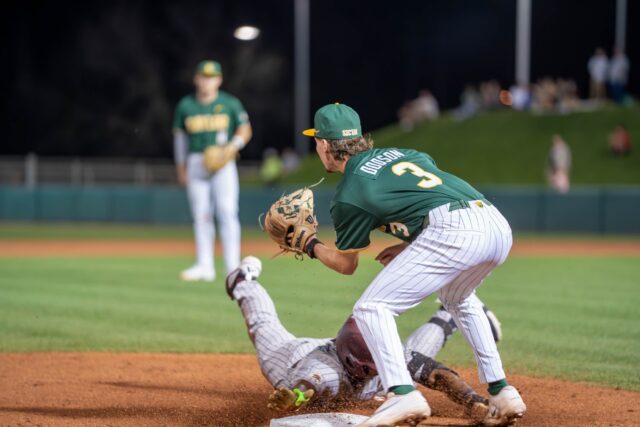 Sophomore infielder Cade Dodson shuts out a runner at the Baylor vs Texas State Baseball game on Tuesday evening at Magnolia Field. Caleb Garcia | Photographer