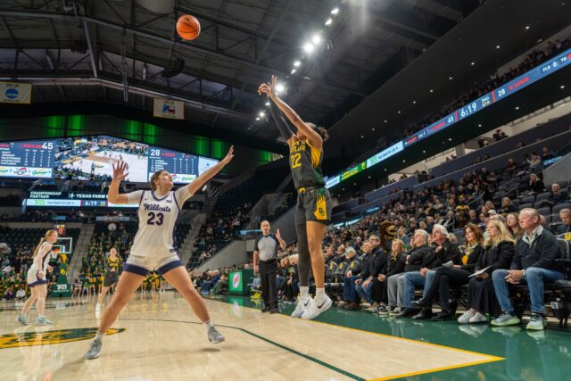 Redshirt junior forward Kyla Abraham shoots a three pointer at the Baylor vs Kansas State Women's basketball game on Monday night at Foster Pavilion. Caleb Garcia | Photographer