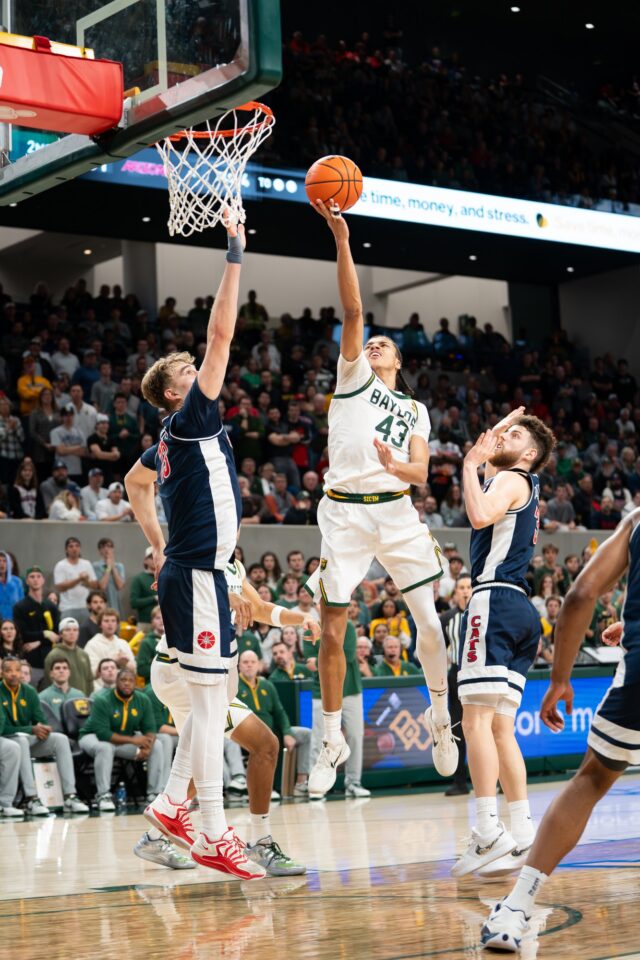 Redshirt sophomore Cameron Carr finishes a finger-roll layup during Baylor's 87-80 loss to Arizona on Tuesday night. Abby John | Roundup Photo Editor