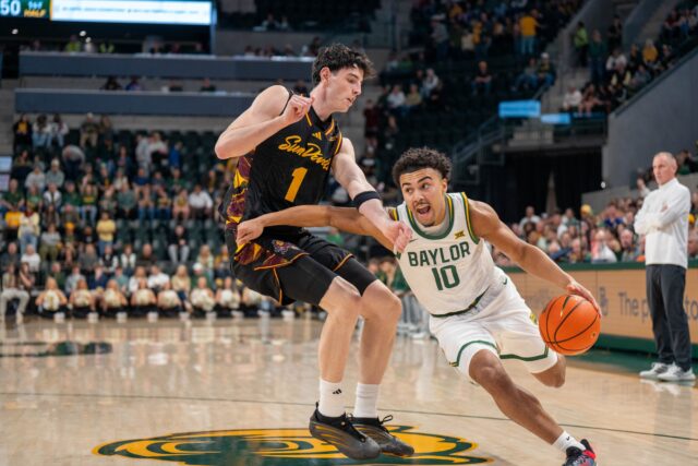 Sophmore guard Issac Williams IV drives to the basket during No. 14 Baylor Men’s Basketball’s win 73-68 against Arizona State Saturday afternoon at Foster Pavilion. Mesha Mittanasala | Photographer