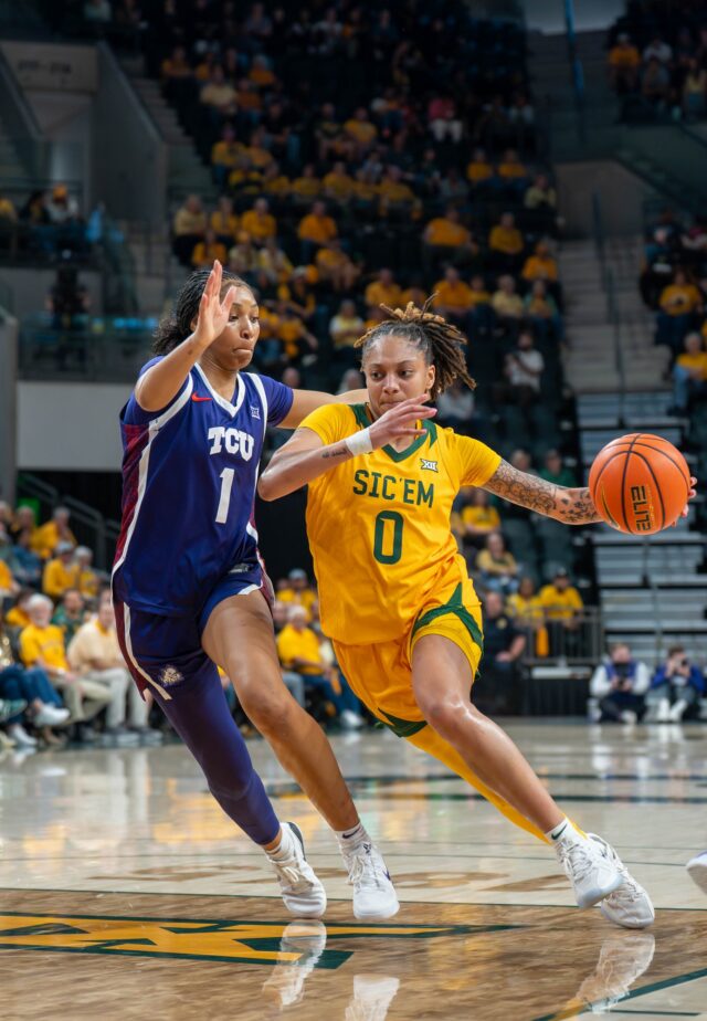 Redshirt sophmore guard Taliah Scott drives to the basket during No. 12 Baylor women's basketball's 67-83 loss over TCU Thursday night at Foster Pavilion. Mesha Mittanasala | Photographer
