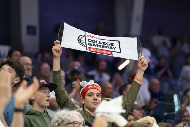 A TCU fan shows off his College GameDay banner after TCU Basketball hosted ESPN's College GameDay for the first time during the TCU-Baylor Women's Basketball game on Sunday evening at Schollmaier Arena in Fort Worth. Jake Schroeder | Photographer