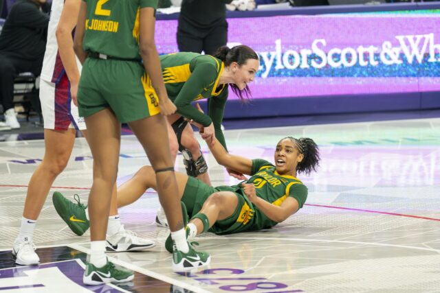 Freshman guard Marcayla Johnson celebrates after drawing a foul and sinking the basket during the Bears' 65-53 loss on Sunday evening against TCU at Schollmaier Arena in Fort Worth. Jake Schroeder | Photographer