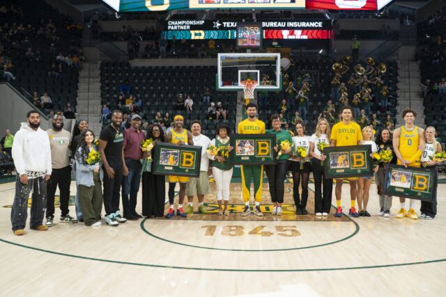 Fifth-year Senior guard Obi Agbim, Senior center Caden Powell, Senior guard Michael Rataj, and Senior guard Dan Skillings Jr., as well as their families and guests, pose for a picture during Senior night celebrations before the Bears' 101-75 win on Saturday evening against Utah at Foster Pavilion. Jake Schroeder | Photographer