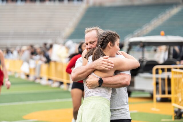 Tyler senior Caroline Twaddell hugs her father after finishing the Bearathon Saturday morning at McLane Stadium. Alyssa Meyers | Photographer