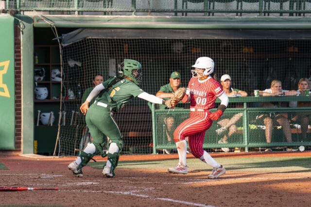 Junior Catcher Abi Flores stops UIW’s Jaisy Caceres in her tracks, getting the out and protecting home plate in order to stop the incoming run. Jake Schroeder | Photographer