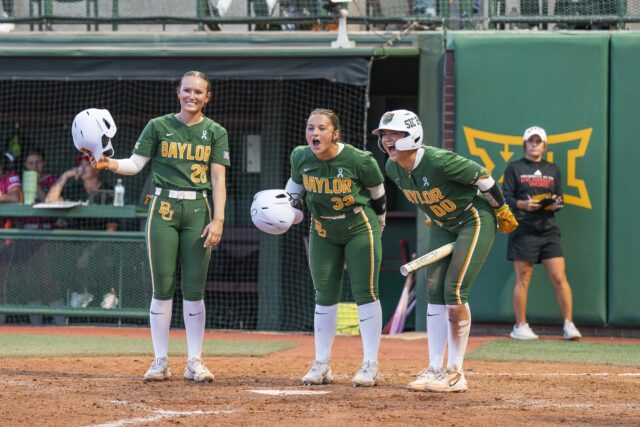 Sophomore second baseman Faith Piper, freshman designated player Olivia Buettner, and freshman third baseman Kaygen Marshall celebrate as junior first baseman Leah Cran rounds the bases after a late-game homerun to give the Bears the lead. Jake Schroeder | Photographer
