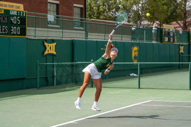 Junior Zuzanna Kubacha delivers a dagger of a serve. Brady Harris | Photographer