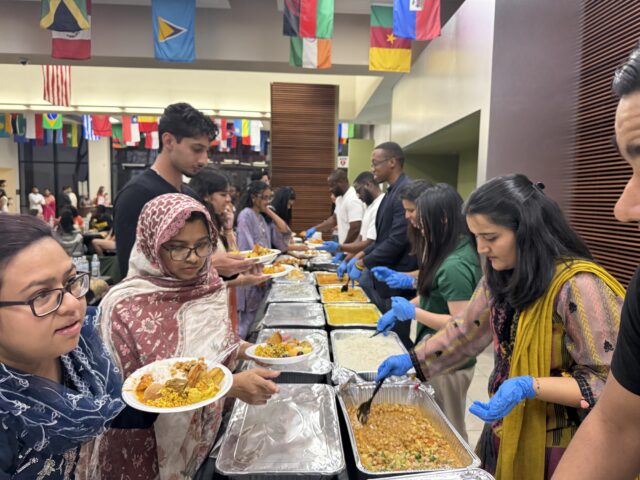 Baylor's Intercultural Engagement Department and Center for Global Engagement serve food traditionally eaten during Iftar to attendees. Photo courtesy of Giselle Lee