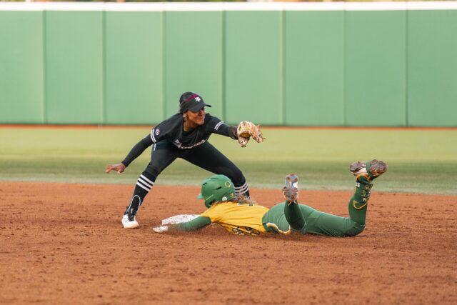 Sophomore second baseman Faith Piper slides into second, narrowly avoiding the tag. Jake Schroeder | Photographer