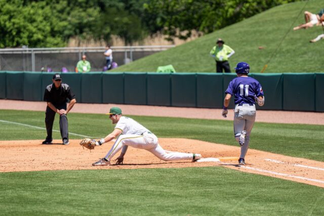 Redshirt senior first baseman Tyce Armstrong reaches for a catch. Alyssa Meyers | Photographer