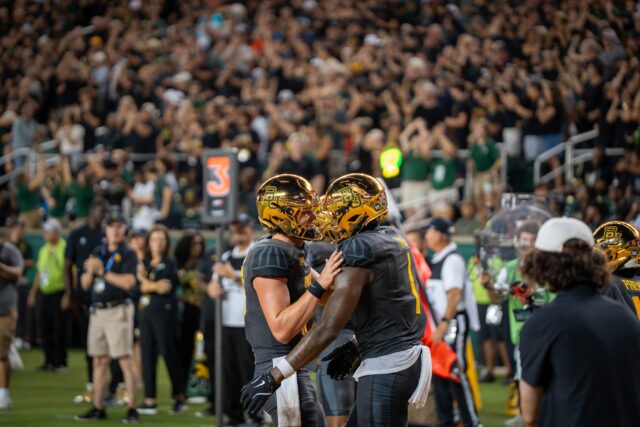 Quarterback Sawyer Robertson (left) and Michael Trigg (right) didn't hear their names called in this weekend's NFL Draft. Both could be priority UDFAs. Sam Gassaway | Photo Editor